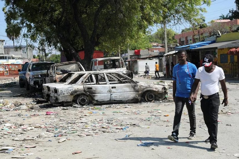 C&aacute;c nh&oacute;m tội phạm tại Haiti đang cố gắng lật đổ Thủ tướng Ariel Henry. Ảnh: Reuters