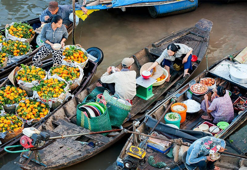 Chợ nổi C&aacute;i Răng - Cần Thơ hấp dẫn nhiều kh&aacute;ch du lịch. Ảnh: Vietnamtourism.