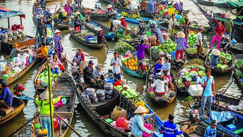 Chợ nổi C&aacute;i B&egrave;, Tiền Giang. Ảnh: Adventure Journey