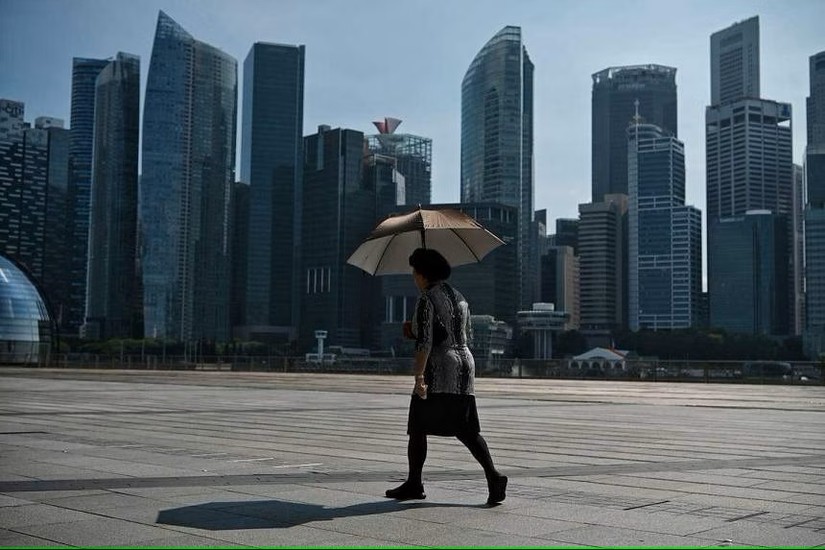 Nhiệt độ cao c&oacute; thể l&agrave;m suy giảm năng suất lao động v&agrave; g&acirc;y ra thiệt hại kinh tế. Ảnh: Straits Times