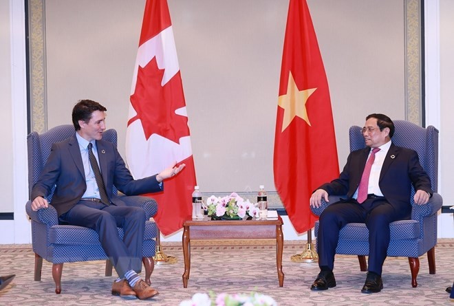 Thủ tướng Phạm Minh Ch&iacute;nh gặp người đồng cấp Canada Justin Trudeau. Ảnh: TTXVN