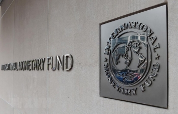 IMF tiếp tục hạ dự báo tăng trưởng toàn cầu
