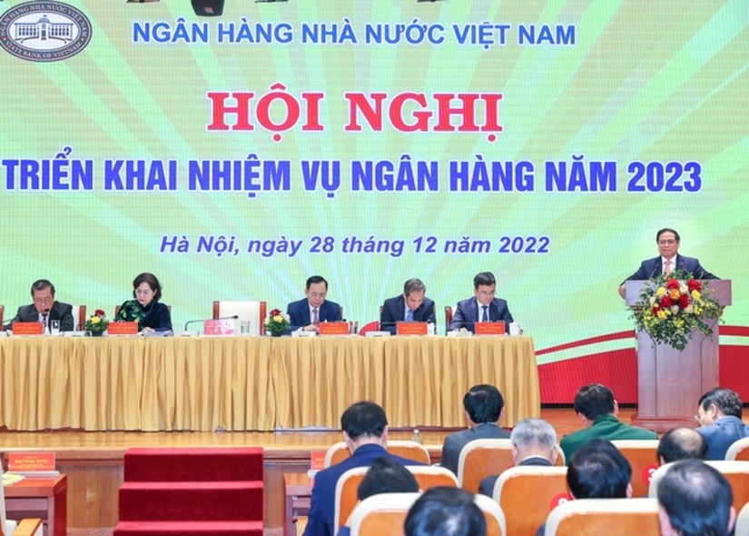 Thủ tướng Ch&iacute;nh phủ Phạm Minh Ch&iacute;nh dự Hội nghị tổng kết c&ocirc;ng t&aacute;c năm 2022 v&agrave; triển khai nhiệm vụ ng&acirc;n h&agrave;ng năm 2023. Ảnh: VGP